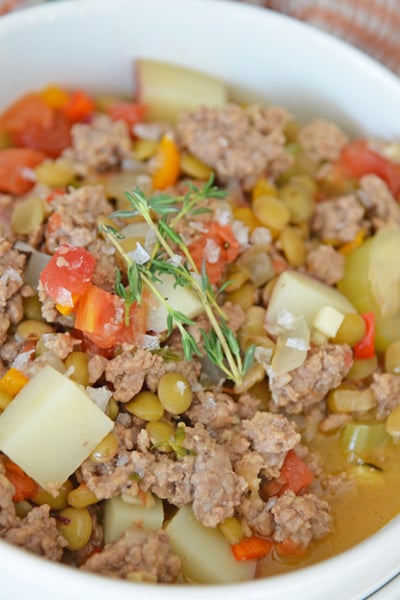 angled shot of bowl of lamb stew