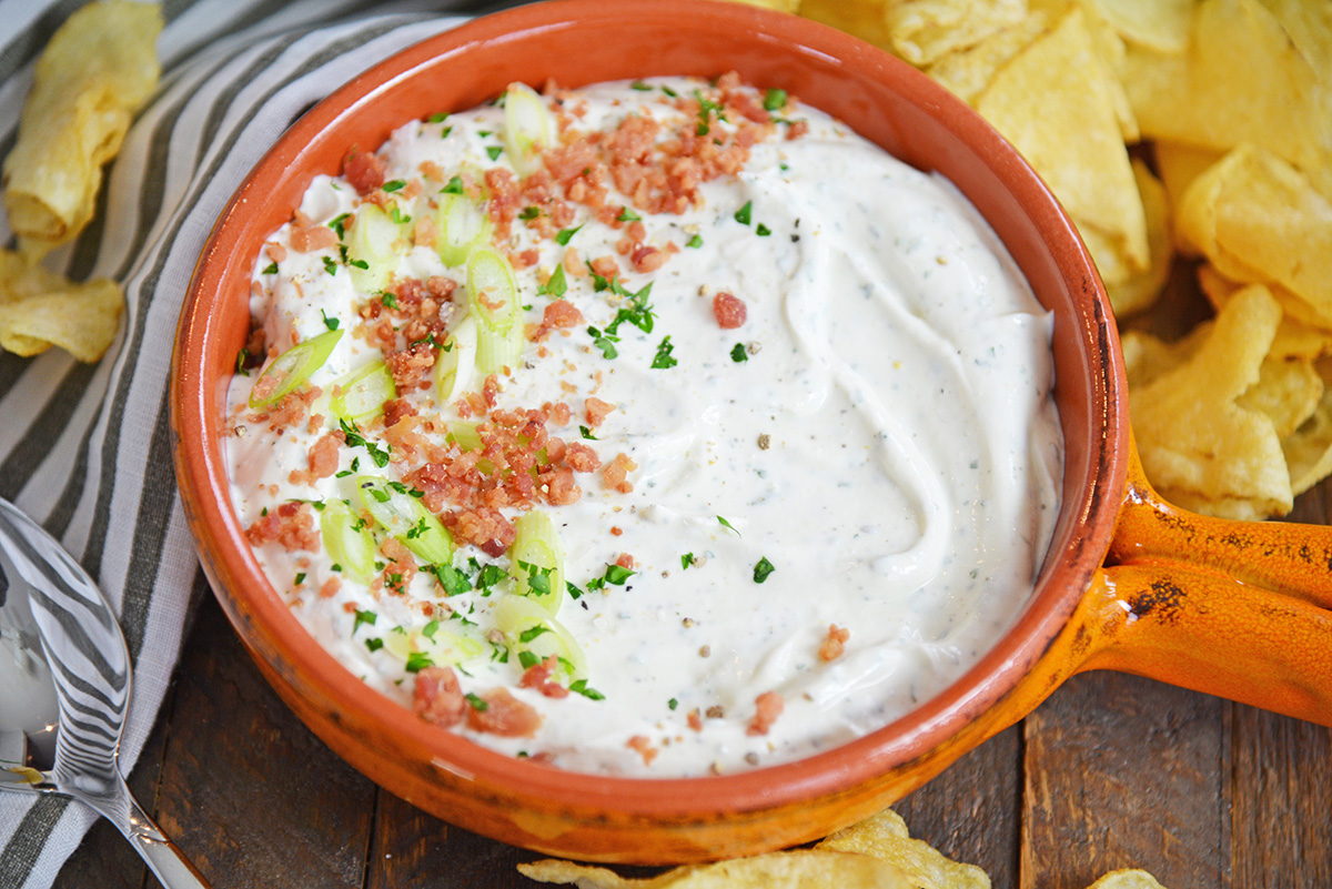 angled shot of bowl of bacon ranch dip