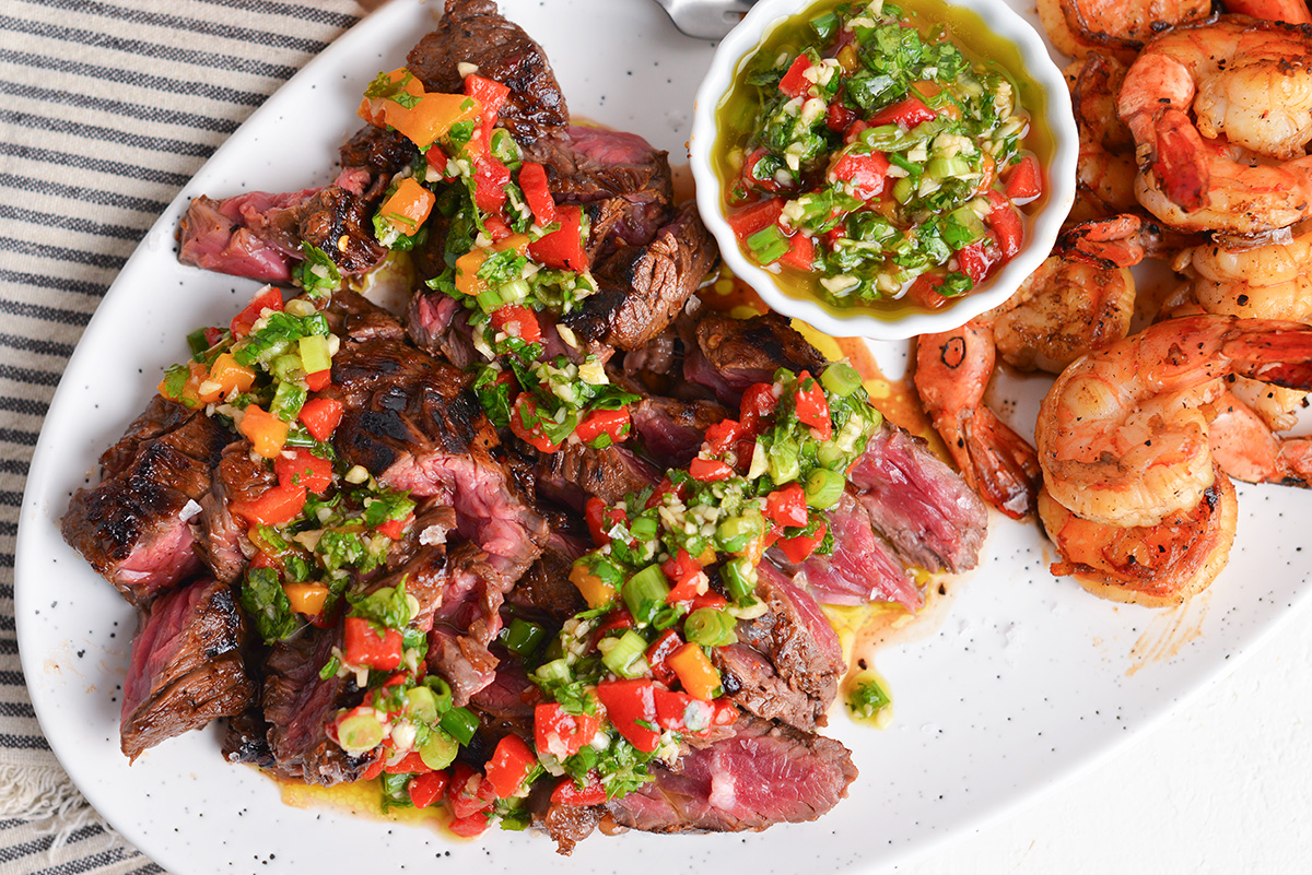 overhead shot of bavette steak on plate with shrimp