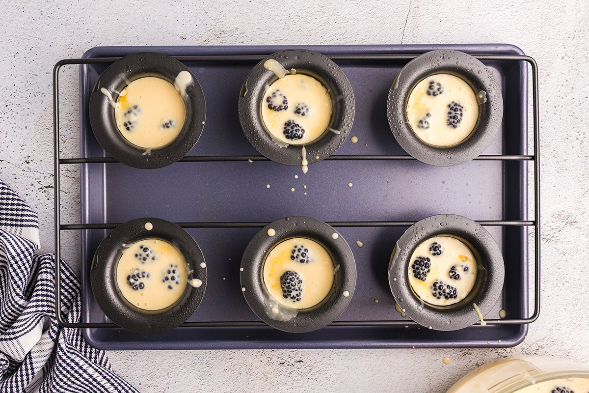 overhead shot of blackberry popover batter in popover pan