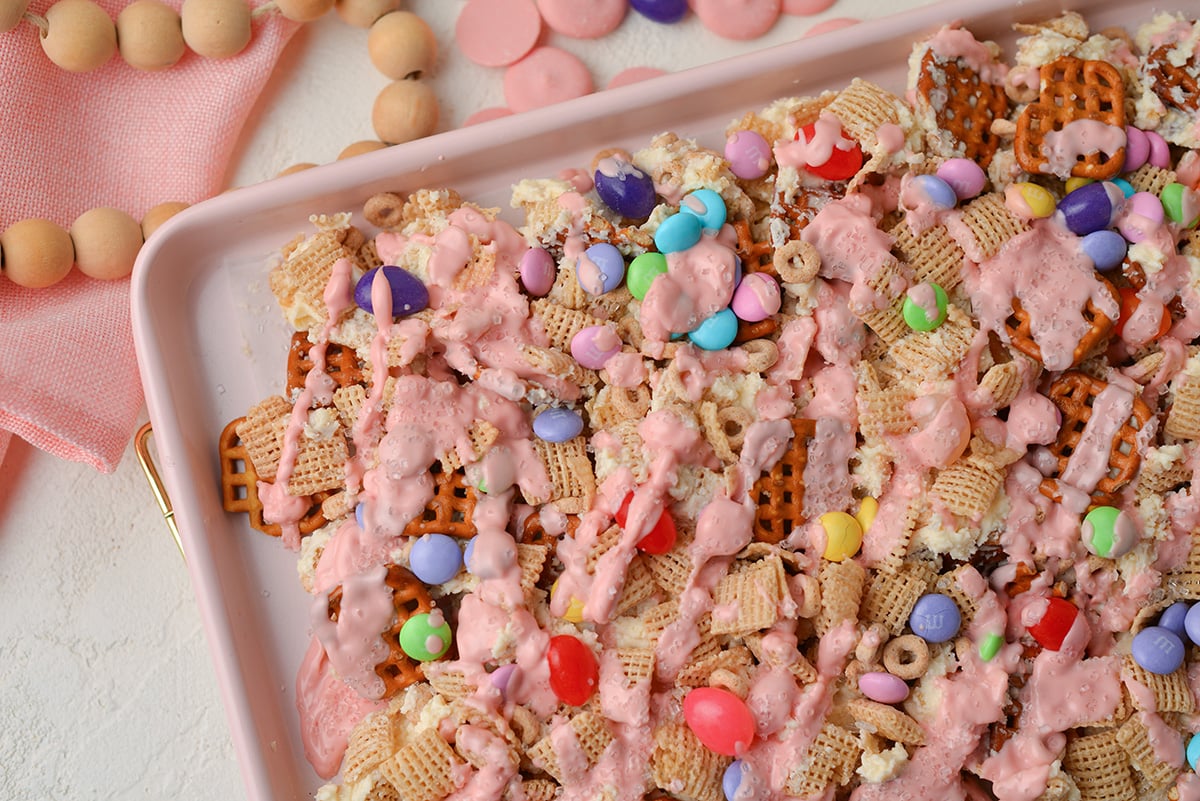 overhead shot of easter snack mix on sheet pan