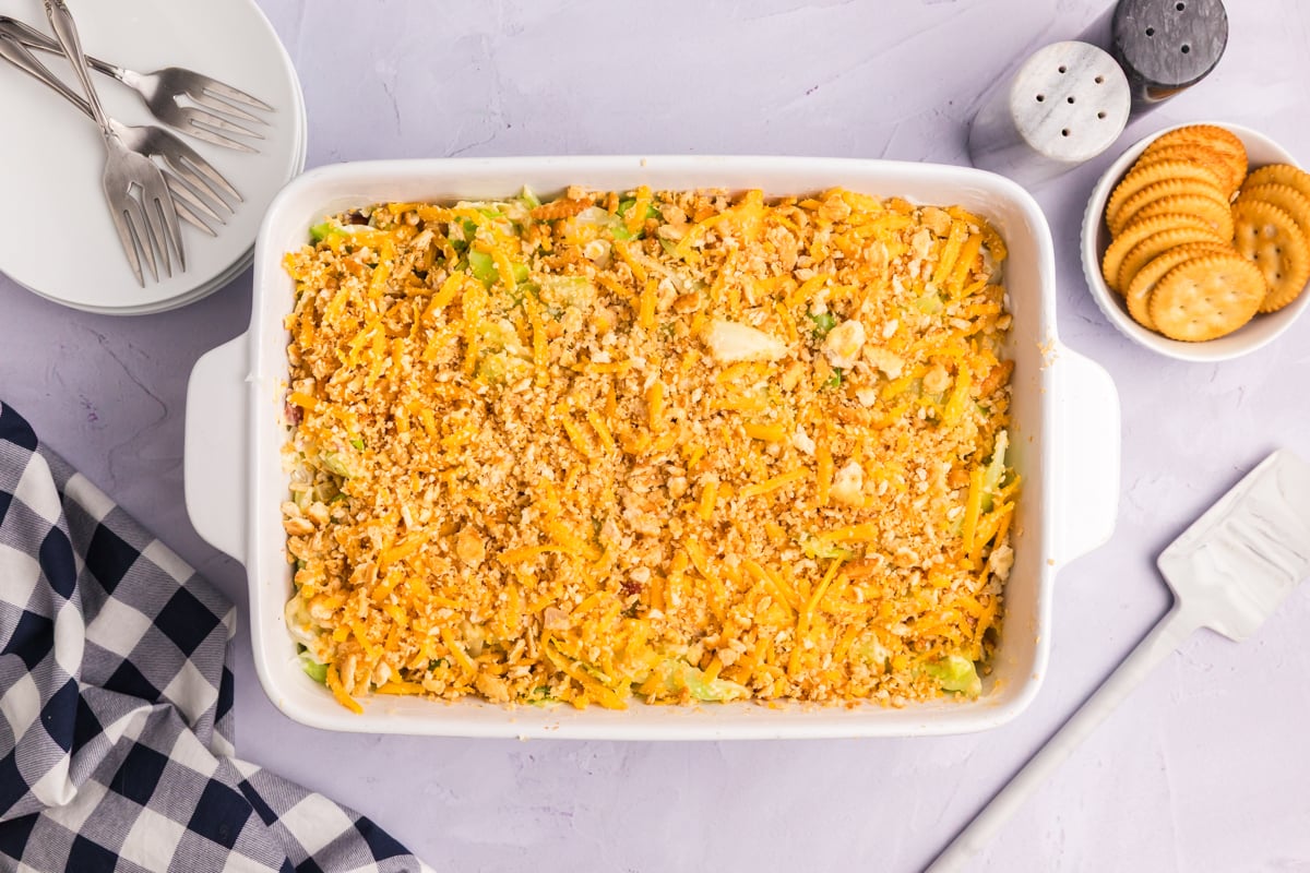 overhead shot of cracker topping on top of cabbage in baking dish