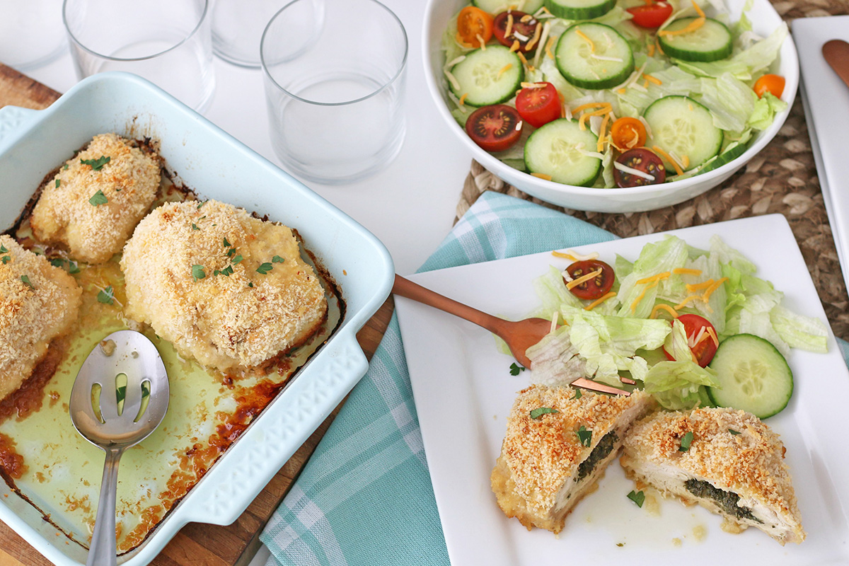 Overhead of chicken kiev on the dinner table