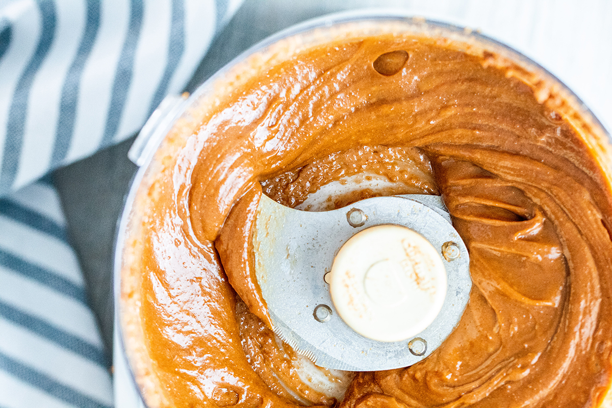 overhead shot of cookie butter in food processor