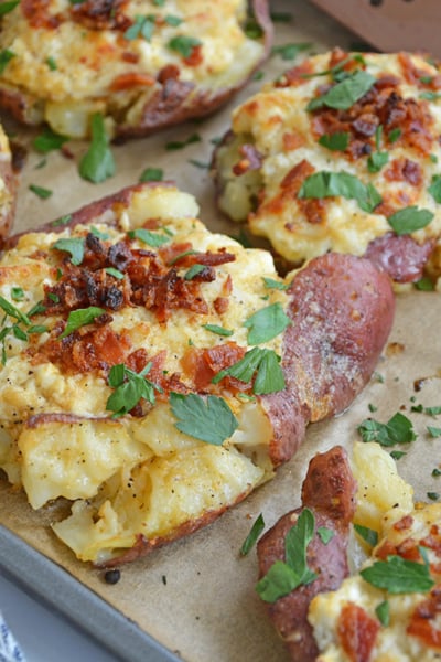 angled shot of crab smashed potatoes on baking sheet