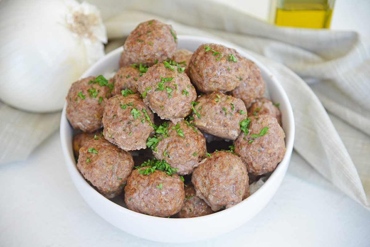 angled shot of bowl of lamb meatballs