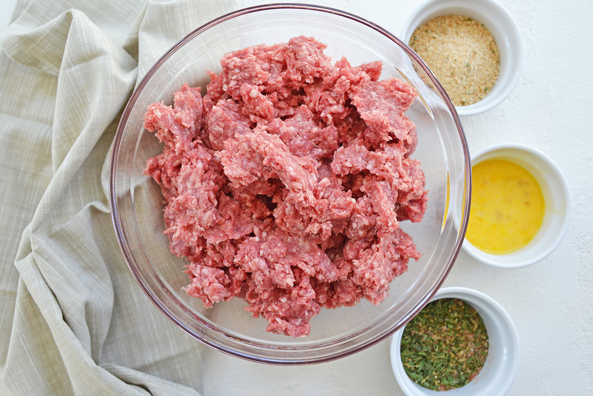 overhead shot of ground lamb meatball ingredients