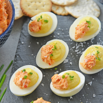 pimento cheese deviled eggs on plate