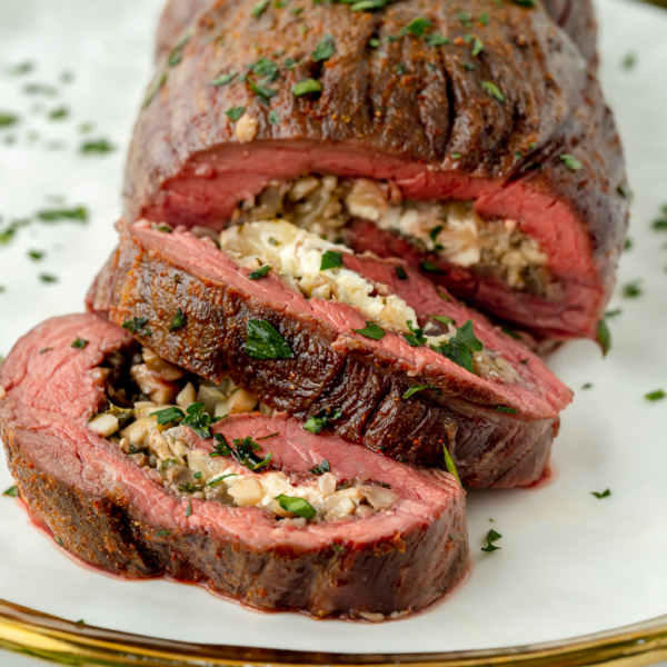 close up of sliced stuffed flank steak